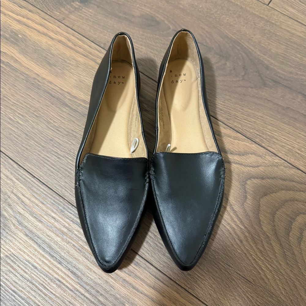 Black dress flats, brand is a new day in a size 8